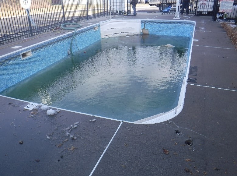 Before - Torn PVC Membrane Pool Renovation
